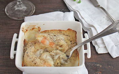 Bacalao al horno gratinado con bechamel y gambas